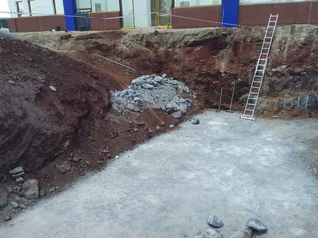 Deep pipeline trench excavation with services laid